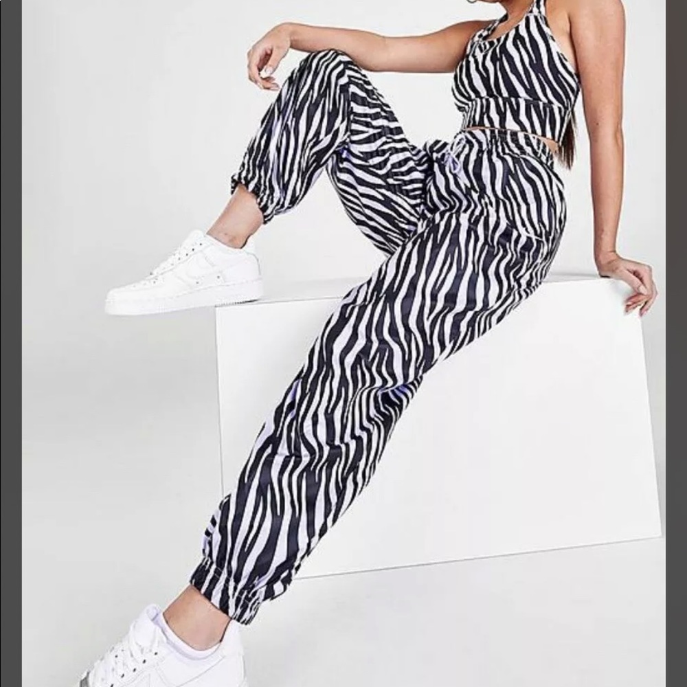 Nike Pants Womens Small Loose Sportswear Icon Clash Allover Zebra Print Purple
